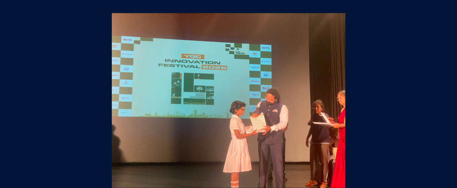 Consul General Shri Sai Murali S. presented awards to young achievers at Yarl IT Fest 2026.